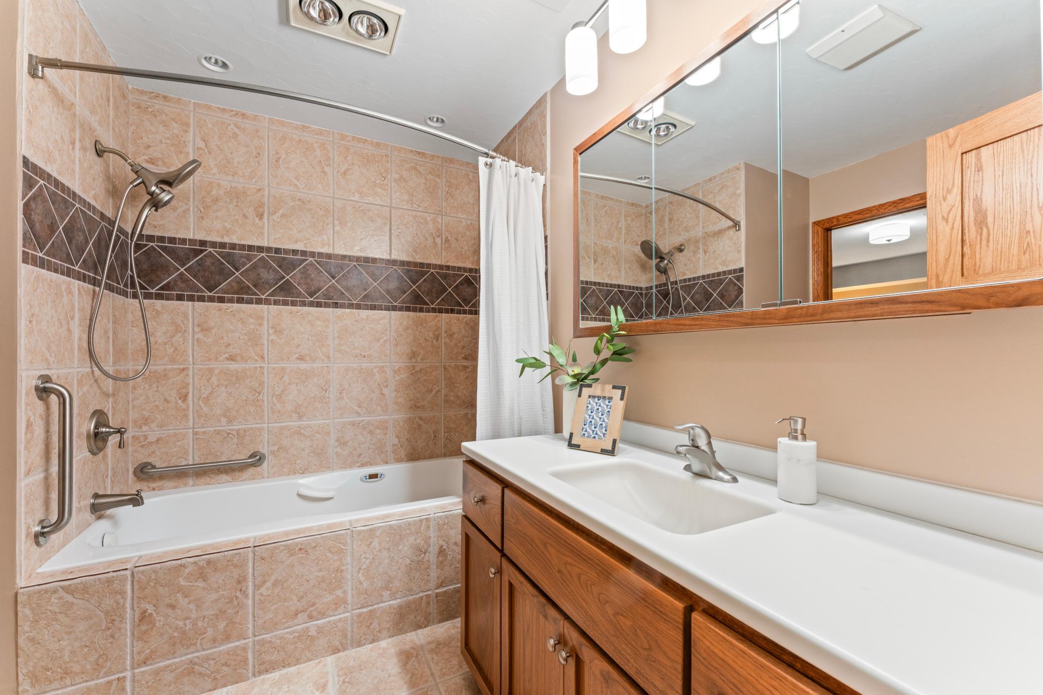 Full-Sized Tiled Main Bath with Jetted Tub