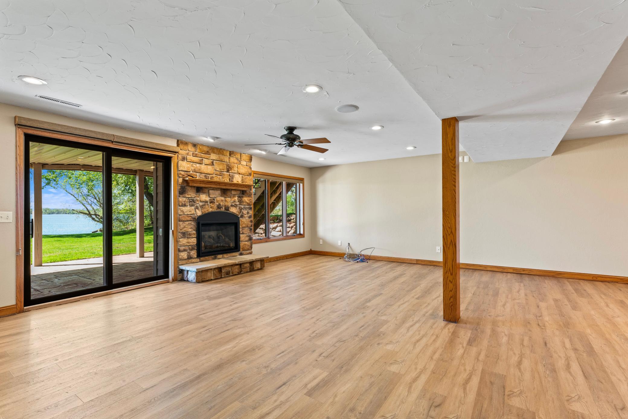 Notice the Gorgeous Gas Fireplace and Walkout onto a Covered Patio
