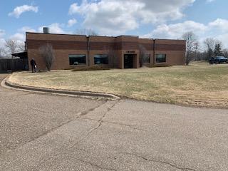 Front elevation. 6803 Sq ft. + 6550 sq. ft of outside, fenced and paved storage. Two private offices and two bathrooms of