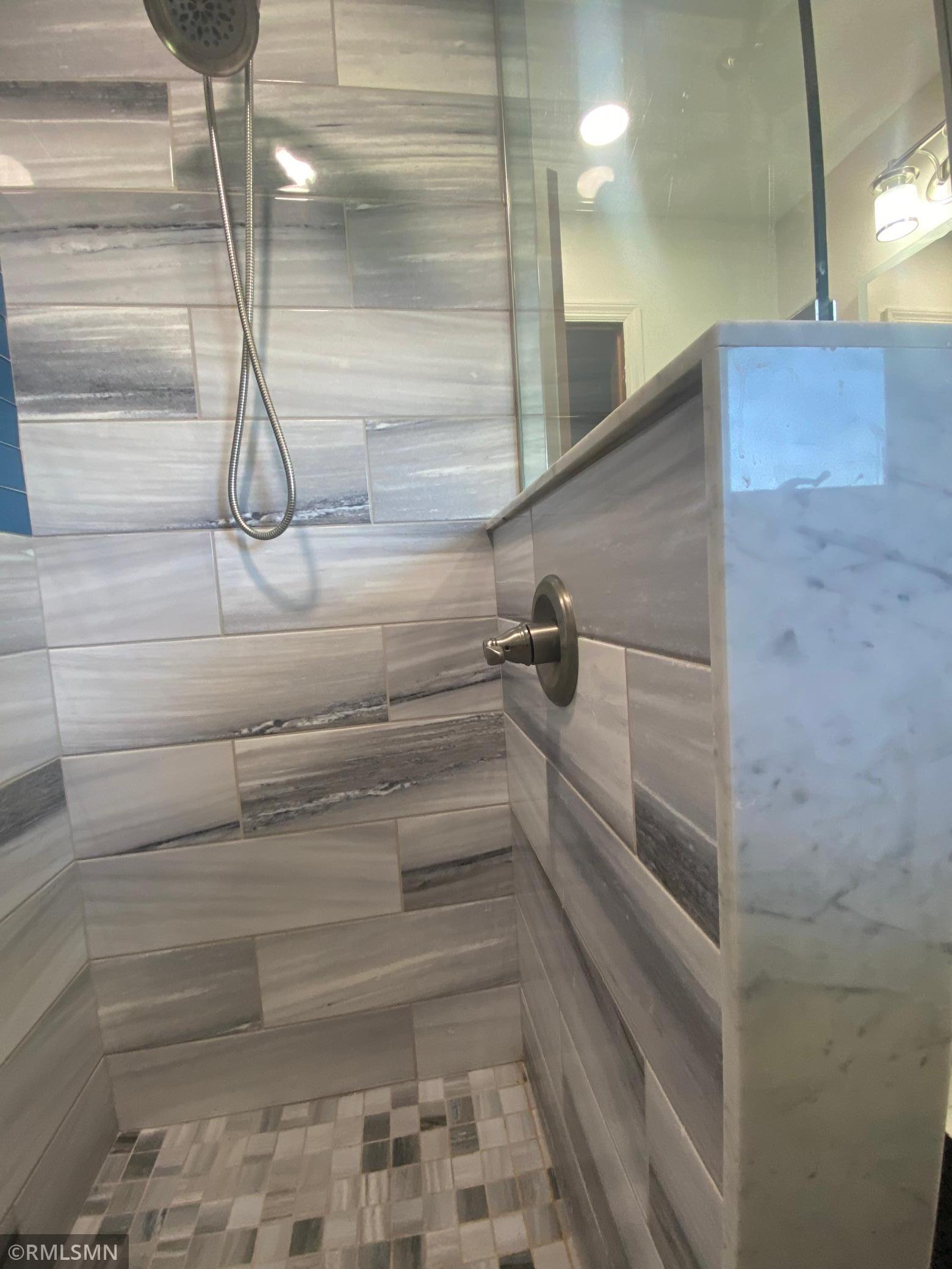 Just reach around the corner and turn the shower on!!! No more getting in and turning the water on!!!