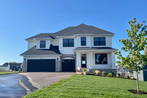 Stunning curb appeal with 4 sided architecture - no vinyl siding.