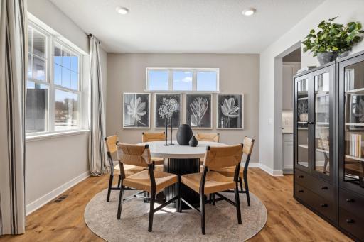 Impressive formal dining room with butlers pantry.
