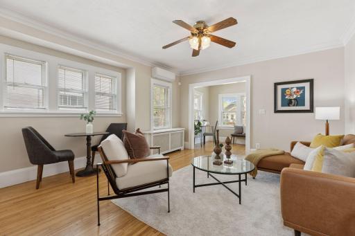 The living room has plenty of space for a small dining table
