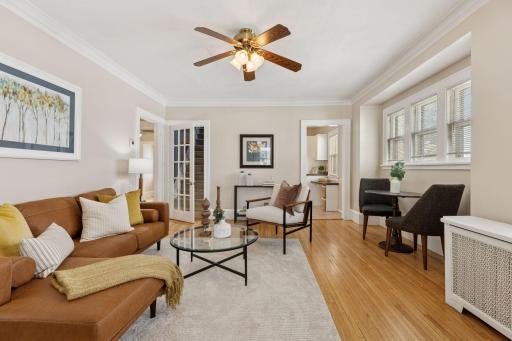 Bright and airy living space with original hardwood floors