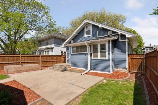 Concrete patio is ideal for outdoor hosting!