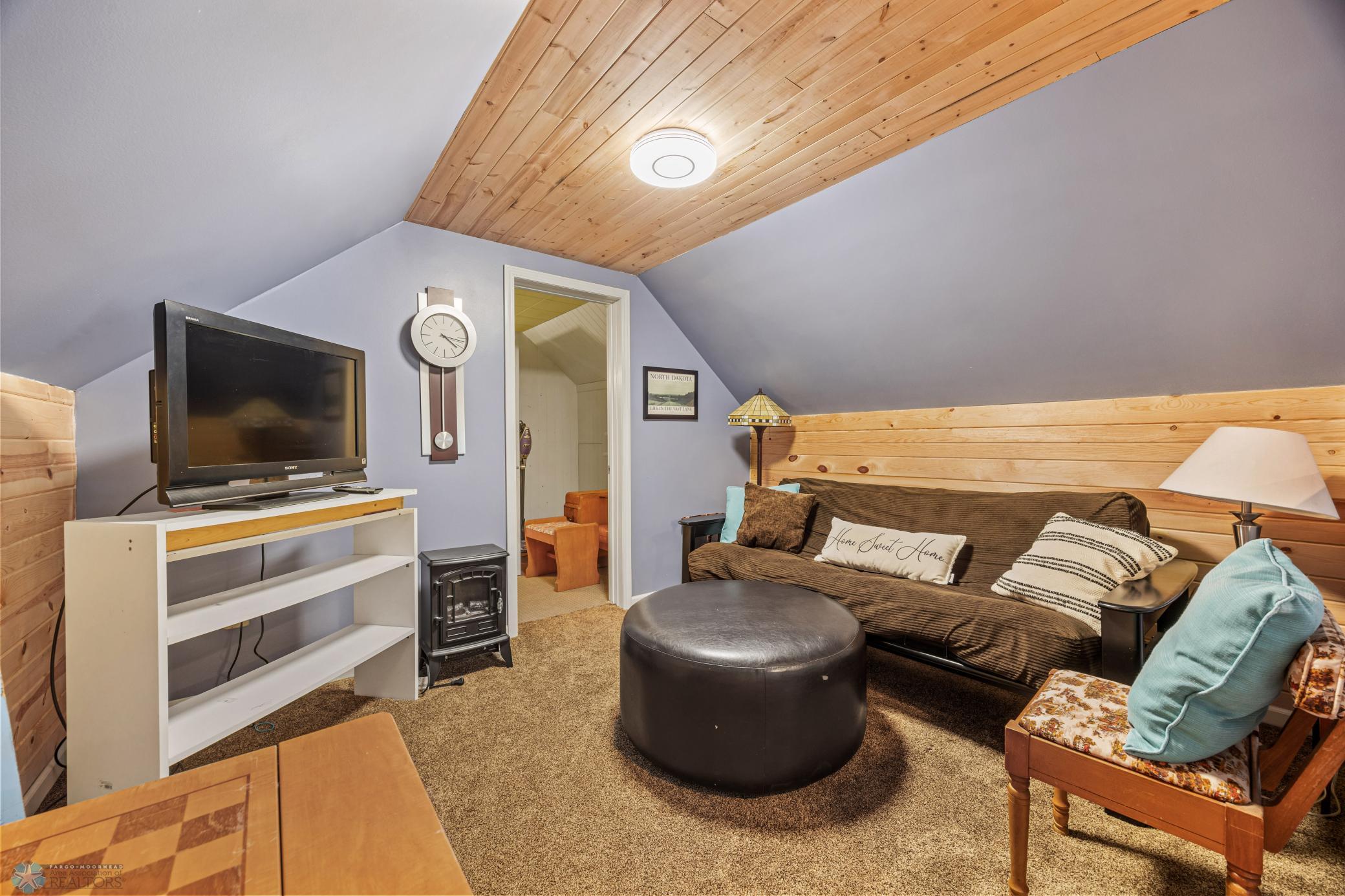 Sitting area in between loft bathroom and rec room