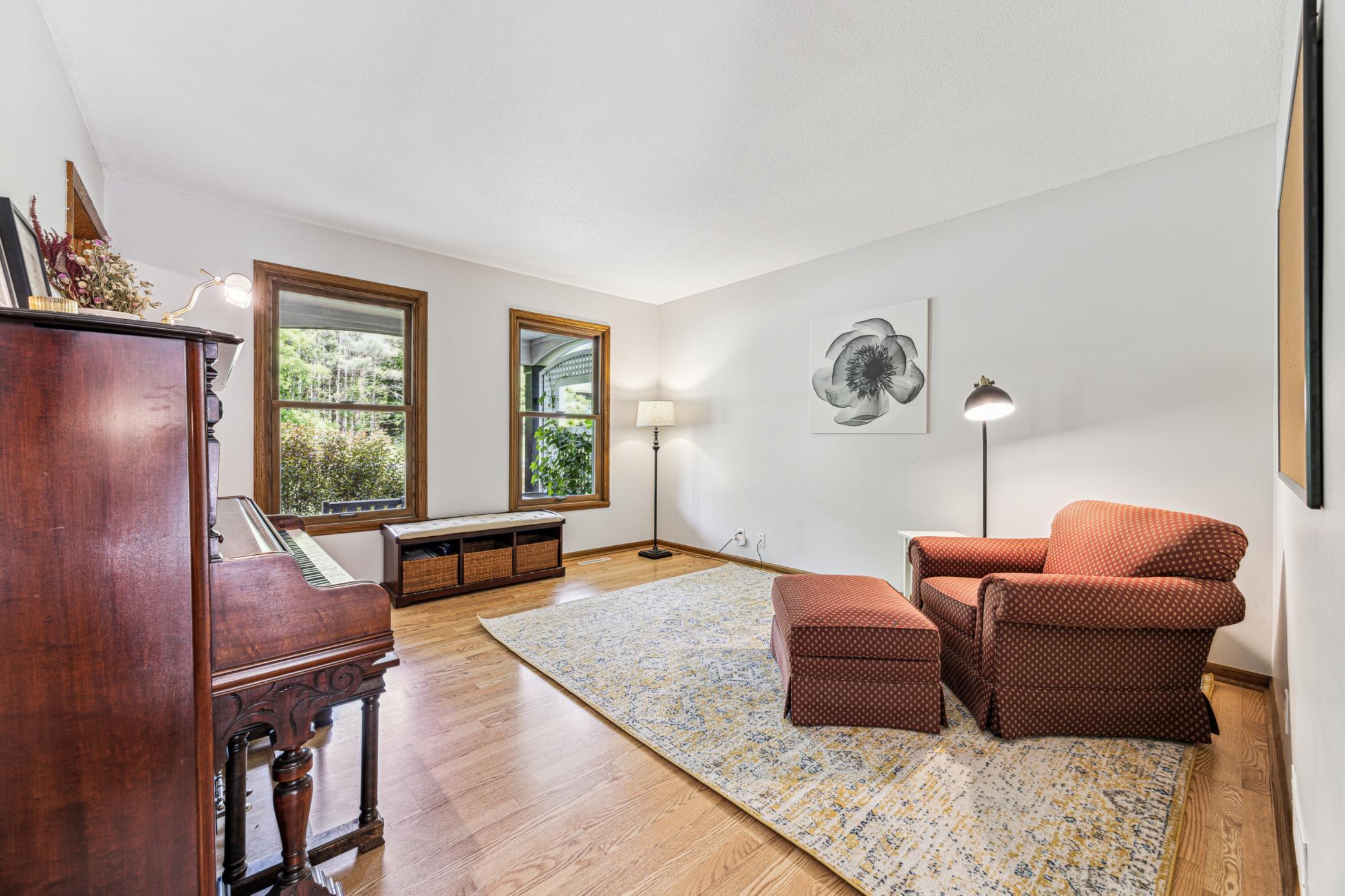 The spacious formal dining room is perfect for hosting large gatherings, but also versatile enough to serve as a music room, second home office, or flex space to suit your needs.