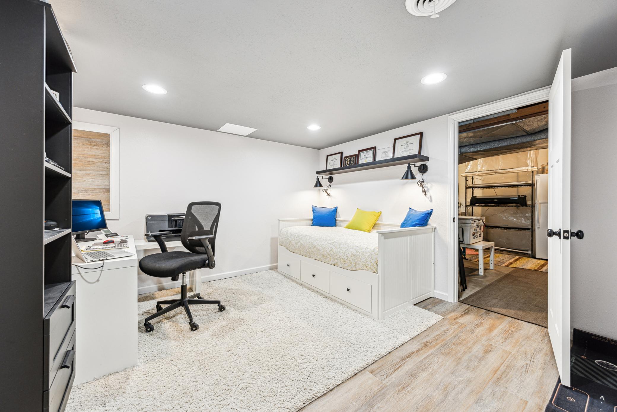 The lower-level office provides a quiet, private space, perfect for focusing on work.