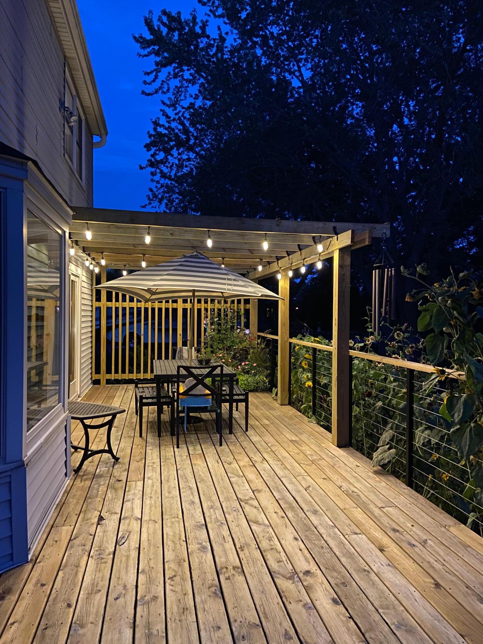 Looking for the perfect spot to enjoy a summer evening? Look no further. Ambient lighting quietly complements the night sky, creating an inviting atmosphere for conversation or quiet reflection.