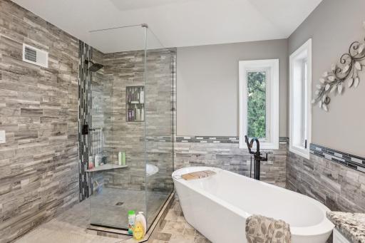 Completed Remodeled primary Bathroom with separate tub and shower