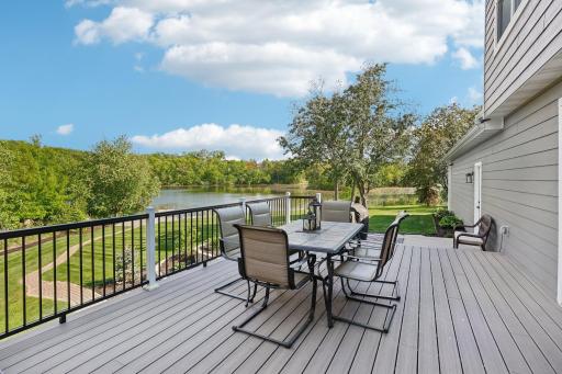 The amazing lake view off the backyard maintenance free deck provides privacy and