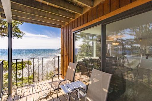 An incredible opportunity awaits to own a stunning, updated, and fully furnished 2-bedroom 2-bathroom unit, nestled directly on the shoreline of majestic Lake Superior.