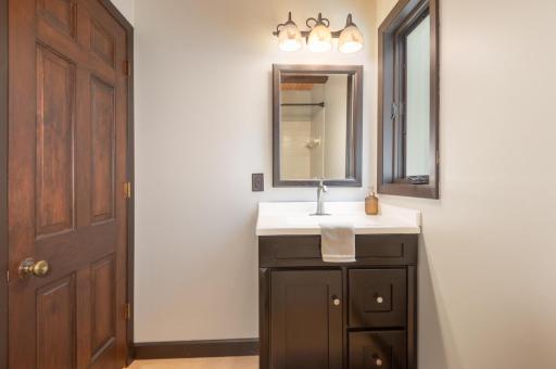 The main floor bath has seen some recent updating.