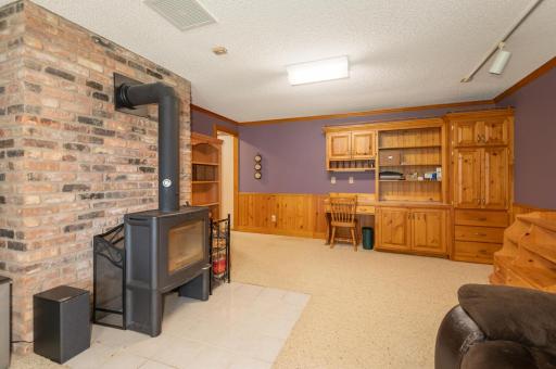 There is built in cabinetry and the wood stove will keep you warm and comfortable on a cool day!