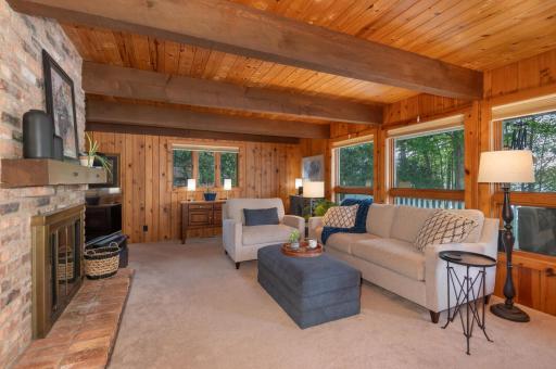 Huge exposed beams with tongue and groove wood walls feel like you are in the north woods or mountain region.