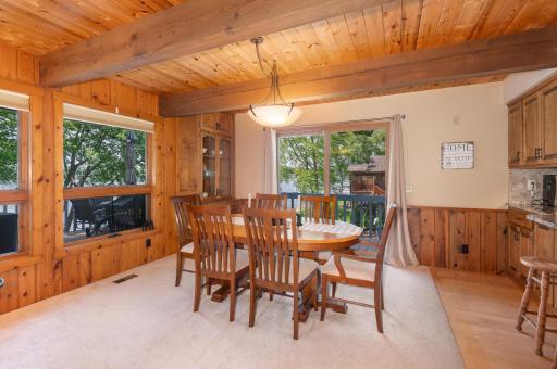 Dine with guests and step out the sliding door to the huge south facing deck with outstanding lake views.