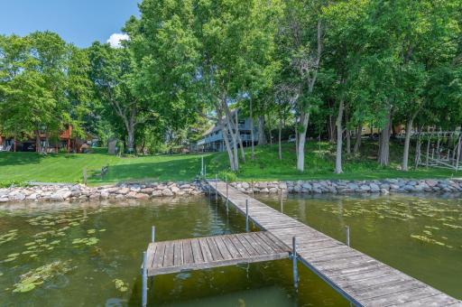 You will appreciate the quality boulder rip rap shoreline, sandy bottom and south facing lake views!
