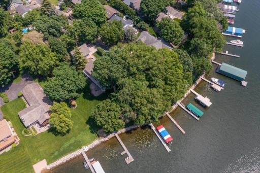 Aerial view of the fantastic half acre lot with 130 feet of lakeshore.