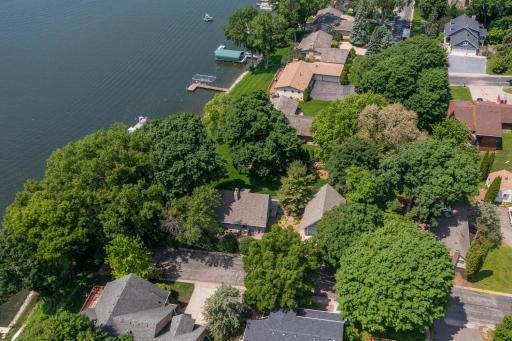 Mature trees provide some shade on the half acre lot.