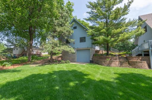 A driveway accesses the back yard and lower garage. Excellent storage for a fishing boat, waive runners and lake items.