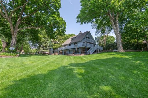 Stroll across the plush, manicured lawn. An easy walk to the dock and boat. Great for lawn games and playing ball.