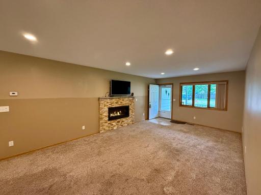 Living Room with a cozy gas fireplace to enjoy those chillier Mn days and evenings