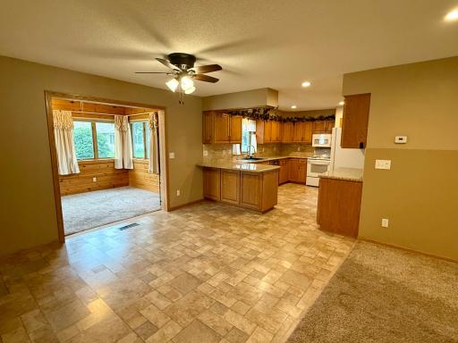 Dining Area connecting to the sunroom, kitchen, and living room!
