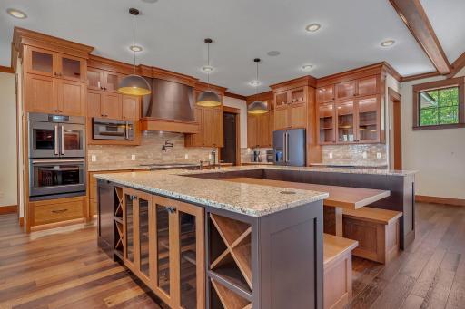 Kitchen center island featuring a built-in wine holder.