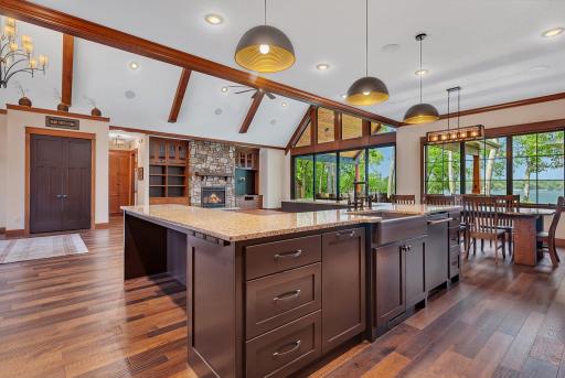 Large center island with ample space for bar stool seating, ideal for casual meals and entertaining.