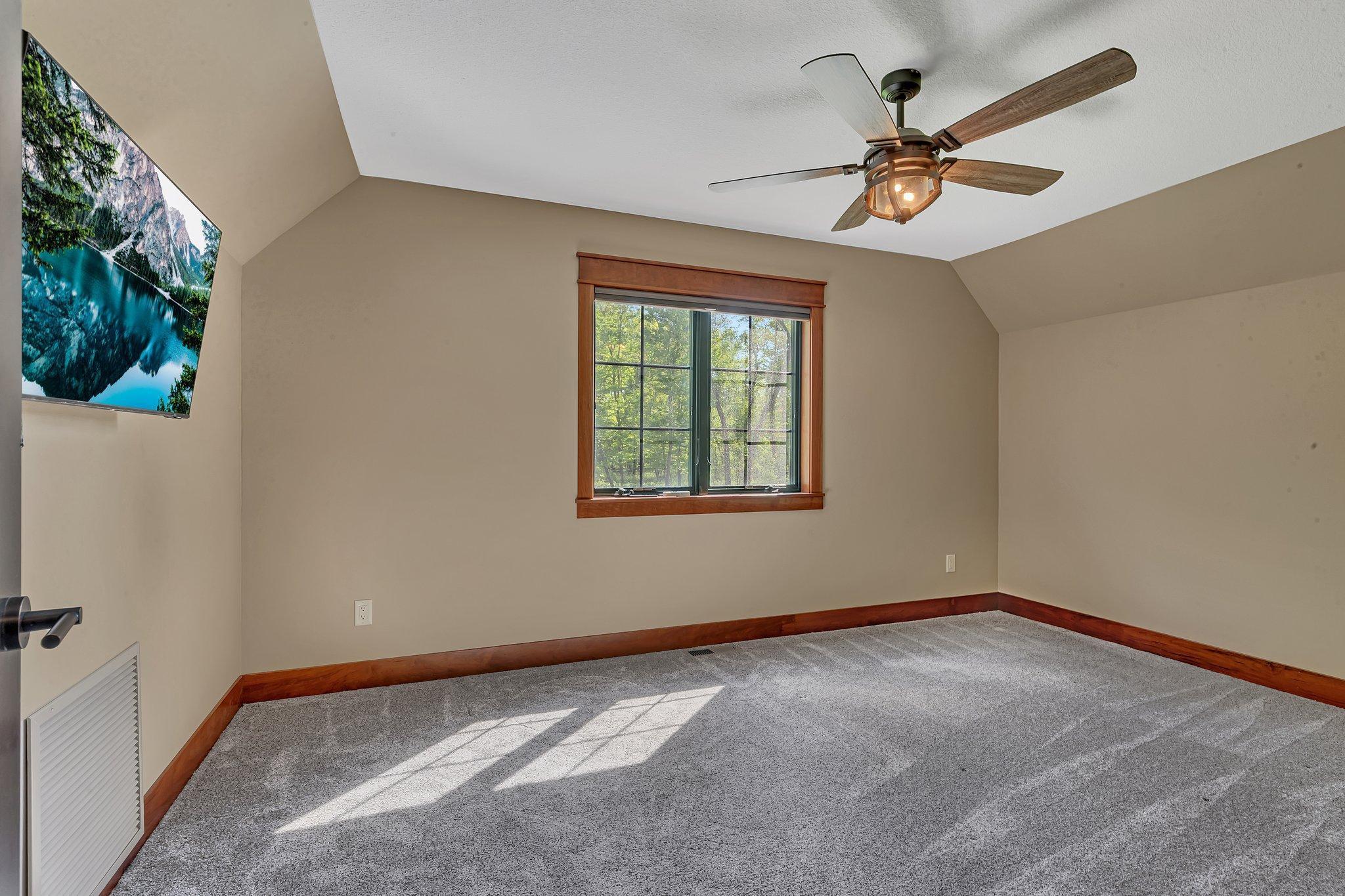 Versatile bonus room, perfect for a home theater, playroom, gym or additional living space, ready to suit your needs.