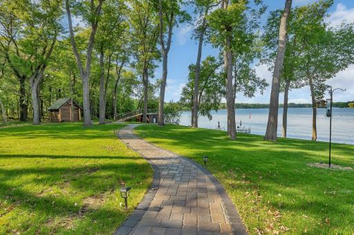 Enjoy panoramic lake views along the beautifully landscaped walkway leading down to the water’s edge.