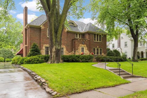 The soft sidewalk and driveway are concrete in pristine condition