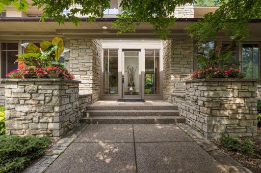 Designed by SKD Architects, this home connects indoor and outdoor living with strategically placed windows and skylights filling the home with natural light. Flowing spaces incorporate organic elements and sophisticated design throughout.