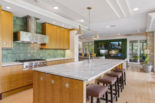 The grand 10' x 4' island provides casual seating for four.