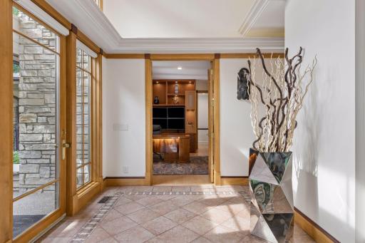 Welcome Hall - a spacious entry with a dramatic 18' ceiling to welcome guests.