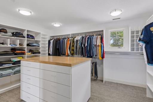 Expansive Walk-in Primary Closet with Built-ins