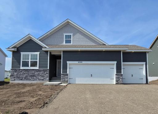 Photo of actual home at 4589 172nd St; Available for quick move-in! Welcome to the Clifton floorplan - A one-level home with primary suite on the main floor, plus 2 additional bedrooms and bathroom, plus a HUGE unfinished lower level!