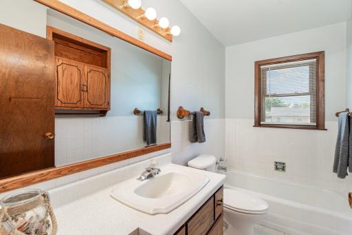 The upper level bath has a built-in medicine cabinet on the back wall.