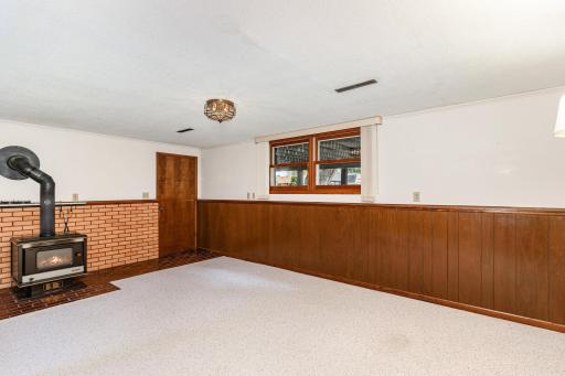 The lower level lookout basement also has a walk-out to the garage - through the door on the left side of the windows.