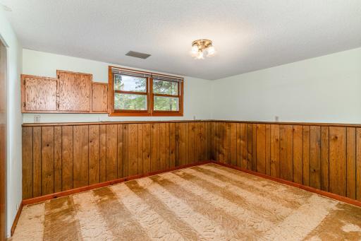 The 3rd bedroom has a double window facing the backyard, built-in cabinets and a large closet.