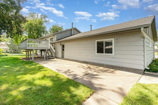 The large cement patio off the deck and garage is another great space for entertaining. There's a side walk to the shed and another around the side of the 3rd garage stall.