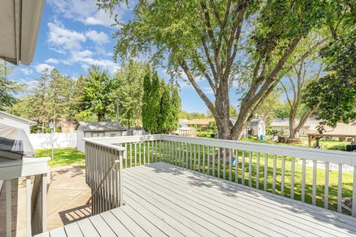 The deck off the dining room has ample space for entertaining and a place for the grill. It walks down to the cement patio off the back of the garage.