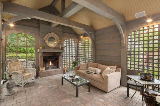 Photo for 1112 Vincent Avenue S, Minneapolis, MN 55405 - listing #6720046 Stunning screen porch with wood burning fireplace!
