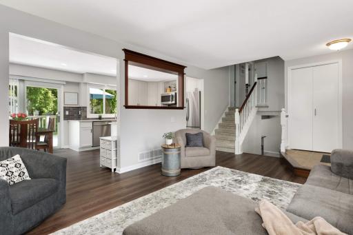 The floor plan is well thought of giving you separate spaces, yet open throughout the main level. The LVP flooring was installed in 2021.