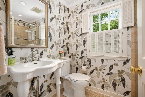 Charming 3/4 main floor bath is adjacent to the the guest bedroom