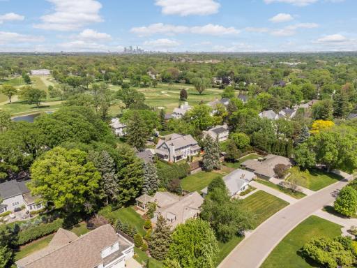 Aerial shot with the Edina Country Club a block away and 50th & France plus downtown Mpls in the distance