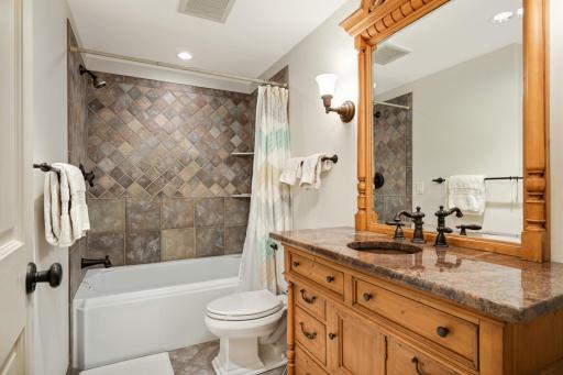There is even a nicely finished full guest bath down.