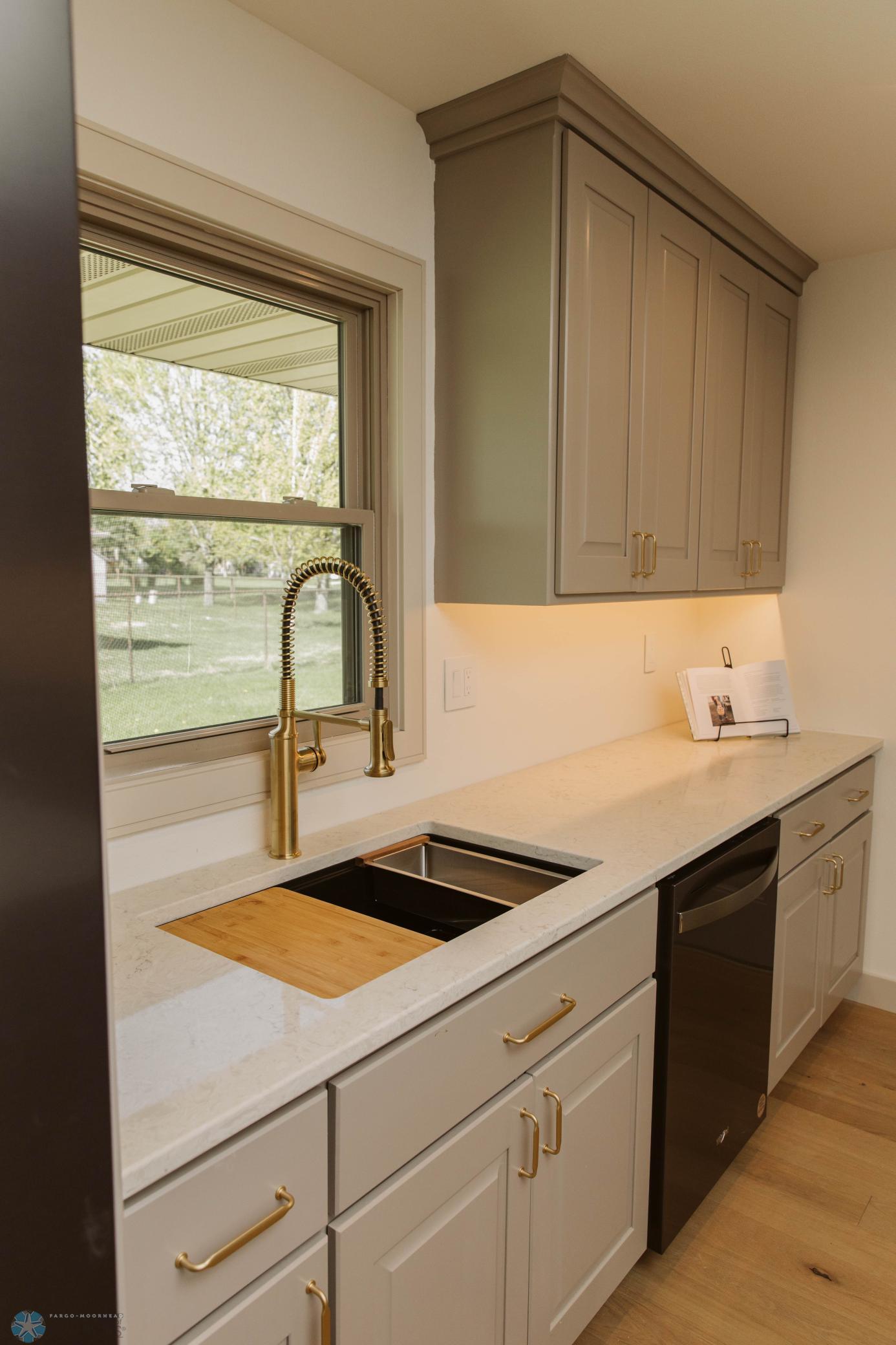 Sink above the Window- Updated Plumbing Fixtures