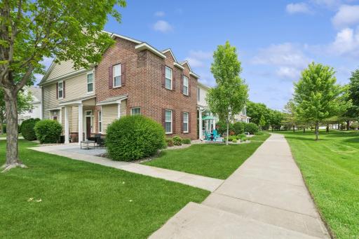 Welcome home to 11041 Fergus Street NE; Unit A & Club West!