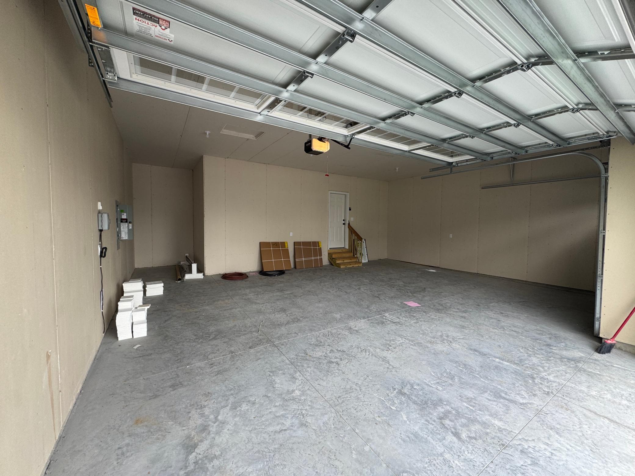 3 stall garage with extra storage or work bench